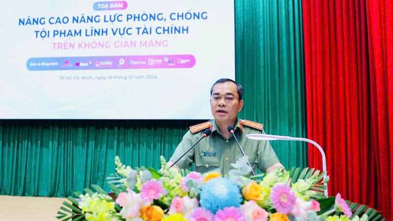 Đại tá Lê Quang Đạo, Phó Giám đốc Công an Thành phố Hồ Chí Minh phát biểu khai mạc tọa đàm.