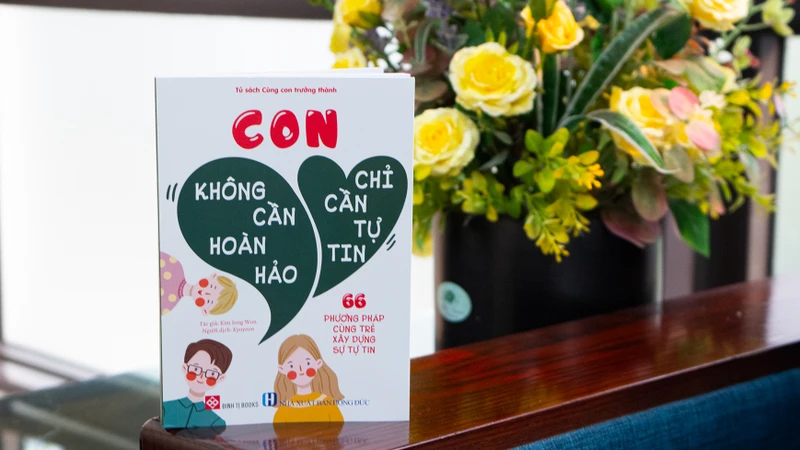 Cuốn sách “Con không cần hoàn hảo, chỉ cần tự tin”. (Ảnh: Đinh Tị Books)