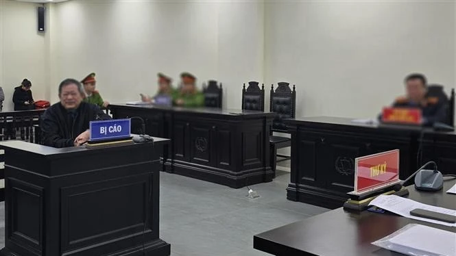 Bị cáo Trần Đình Triển tại một phiên xét xử. (Ảnh: KIM ANH/TTXVN)
