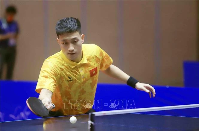 VĐV Nguyễn Anh Tú trong một trận đấu tại SEA Games 31. (Ảnh tư liệu: QUÝ TRUNG/TTXVN)