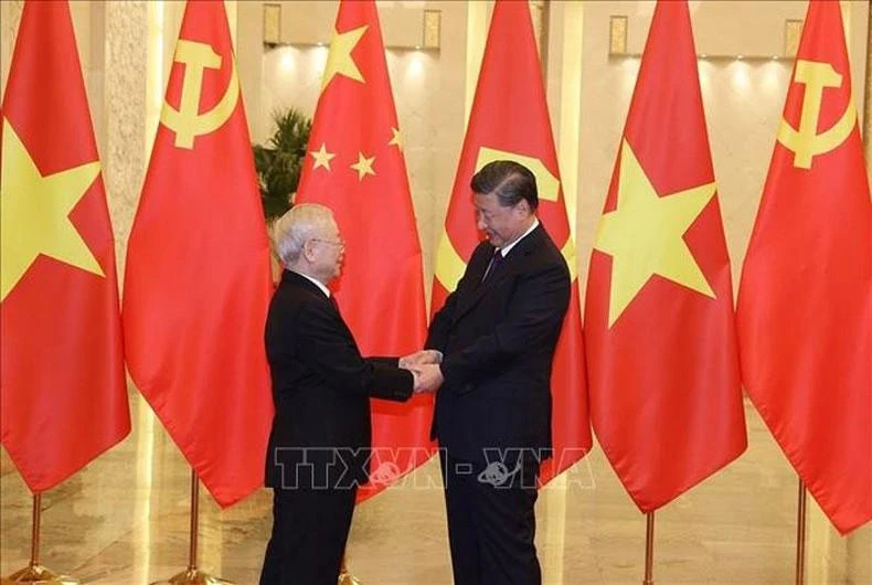 Tổng Bí thư, Chủ tịch Trung Quốc Tập Cận Bình đón Tổng Bí thư Nguyễn Phú Trọng. (Ảnh: Trí Dũng - TTXVN)