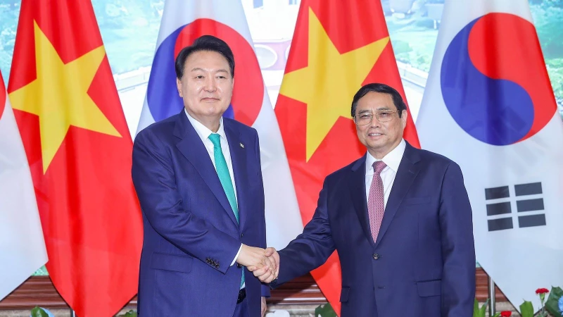 Thủ tướng Phạm Minh Chính hội kiến Tổng thống Hàn Quốc Yoon Suk Yeol nhân chuyến thăm cấp nhà nước tới Việt Nam tháng 6/2023. (Ảnh: VPG)