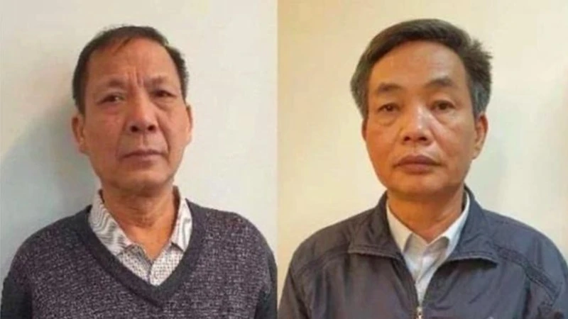 Ông Đặng Ngọc Cầm (bên trái) và Nguyễn Quốc Khánh. (Ảnh: Bộ Công an)