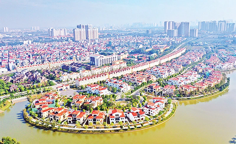 Một góc khu đô thị mới trên địa bàn huyện Hoài Đức. (Ảnh MINH THƯ)
