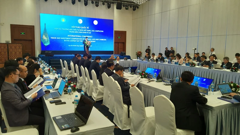 Quang cảnh hội thảo quốc tế với chủ đề: “Hợp tác thương mại, đầu tư giữa Việt Nam, Lào, Campuchia trong bối cảnh kinh tế số”.