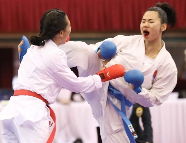 Nữ vận động viên Nguyễn Thị Ngoan (đai xanh) tại Sea Games 31.(Ảnh: Thanh Tùng/TTXVN)