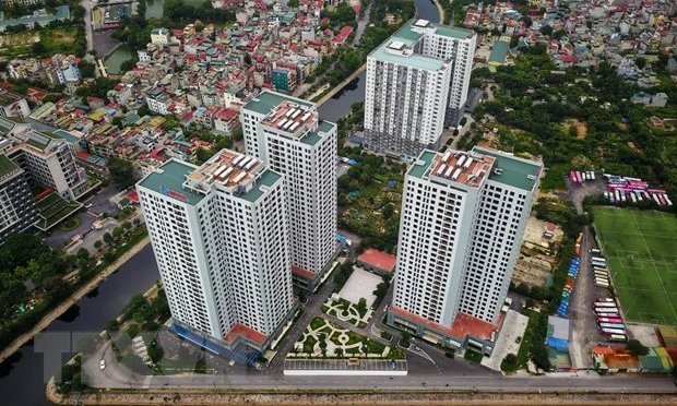 Dư thừa nguồn cung phân khúc cao cấp, thiếu hụt căn hộ giá rẻ, nhà ở xã hội… đang là vấn đề đặt ra. Ảnh: TTXVN