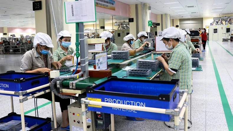 Người lao động làm việc tại khu công nghiệp Quế Võ, Bắc Ninh. (Ảnh: An Trân)