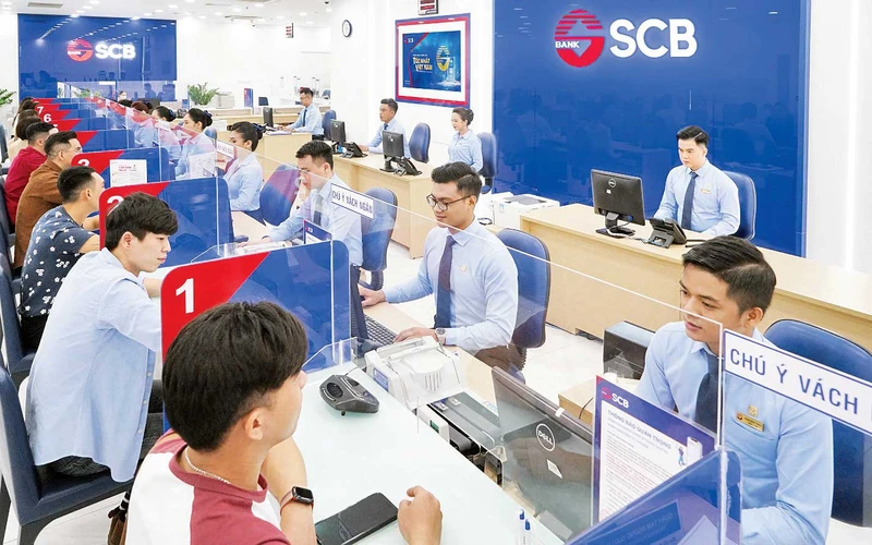 Lãi suất tiền gửi ngân hàng đồng loạt giảm mạnh. Ảnh | Ngân hàng SCB