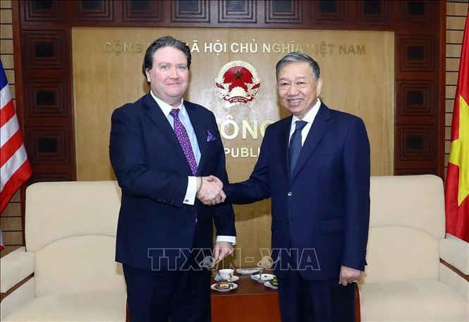 Đại tướng Tô Lâm, Bộ trưởng Công an tiếp Đại sứ Mỹ tại Việt Nam Marc Knapper. (Ảnh: Phạm Kiên/TTXVN)