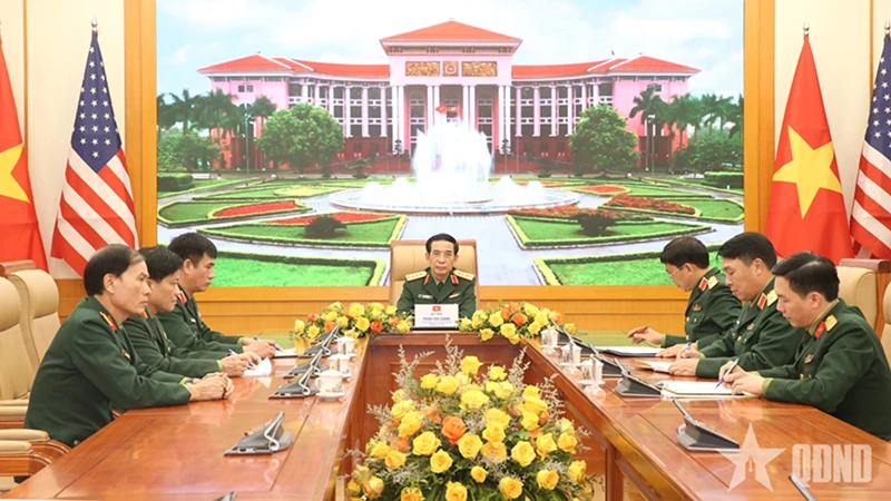 Quang cảnh buổi điện đàm. (Ảnh: Báo QĐND)
