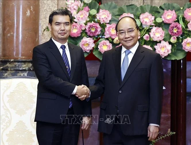 Chủ tịch nước Nguyễn Xuân Phúc tiếp đồng chí Xayxana Khotphouthone, Viện trưởng Viện Kiểm sát nhân dân tối cao Lào. 