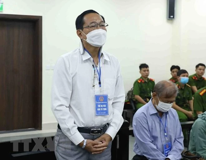 Bị cáo Cao Minh Quang khai báo trước tòa. (Ảnh: Phạm Kiên)