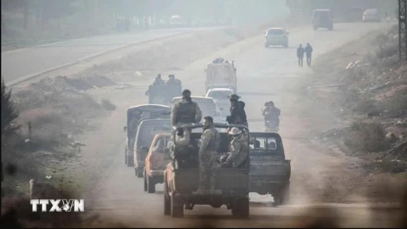 Các thành viên thuộc các nhóm vũ trang tiến về miền Bắc Syria. (Ảnh minh họa: AA/TTXVN)