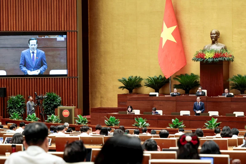 Quốc hội nghe báo cáo tiếp thu, chỉnh lý dự thảo Luật Bảo hiểm xã hội (sửa đổi). Ảnh: DUY LINH