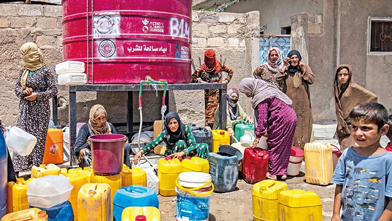 Nhiều người dân Syria phải sống trong cảnh thiếu thốn. (Ảnh THE BUSINESS POST) 