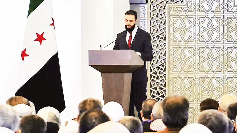 Tổng thống lâm thời Syria phát biểu tại hội nghị đối thoại quốc gia. 