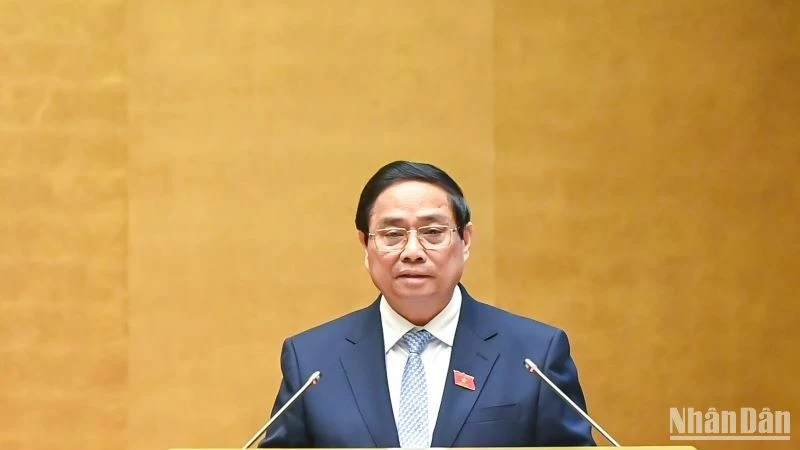 Thủ tướng Phạm Minh Chính trình bày Báo cáo của Chính phủ tại phiên khai mạc Kỳ họp. (Ảnh: DUY LINH)