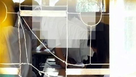 Hình ảnh trong clip vi phạm quy chế thi. (laodong.com.vn)