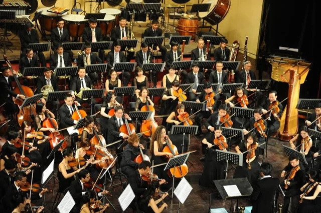 Các nghệ sĩ Dàn nhạc Giao hưởng Quốc gia Việt Nam biểu diễn trong liên hoan Âm nhạc Á - Âu lần đầu tiên tổ chức tại Việt Nam (tháng 10-2014). Ảnh: QUANG TRUNG