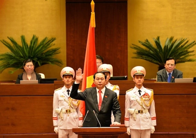 Tân Chủ tịch nước Trần Đại Quang tuyên thệ nhậm chức trước Quốc hội và quốc dân đồng bào. (Ảnh: DUY LINH)