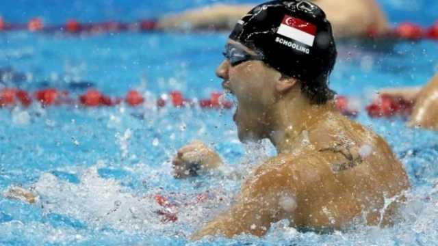 Joseph Schooling ăn mừng chiến thắng. (Ảnh: Reuters)