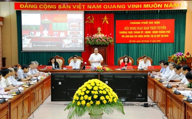 Bí thư Thành ủy Hà Nội Hoàng Trung Hải chủ trì hội nghị giao ban trực tuyến giữa Thường trực Thành ủy, HĐND, UBND Thành phố với các quận huyện, thị xã quý III-2016.