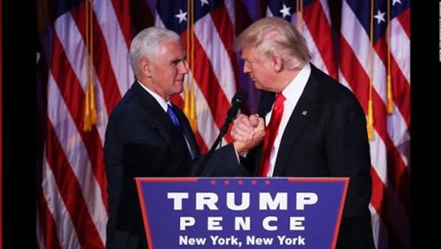 Ông Donald Trump (bên phải) và ứng viên Phó Tổng thống đảng Cộng hòa Mike Pence phát biểu sau khi giành chiến thắng trong cuộc bầu cử Tổng thống Mỹ ngày 8-11-2016, tại New York, Mỹ. (Ảnh: CNN)
