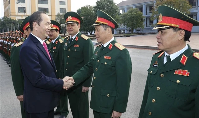 Chủ tịch nước Trần Đại Quang đến thăm lực lượng vũ trang Quân khu 1 (tại Thái Nguyên) sáng 18-12. Ảnh: TTXVN