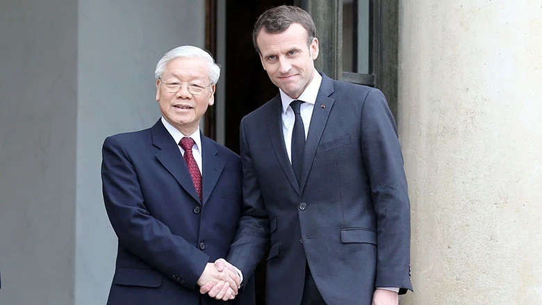 Tổng thống Pháp E. Ma-crông đón Tổng Bí thư Nguyễn Phú Trọng. Ảnh: TRÍ DŨNG (TTXVN)