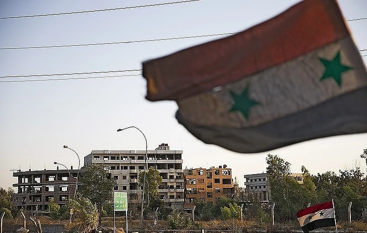 Các tòa nhà bị bỏ hoang sau khi xảy ra đụng độ tại Syria. (Ảnh: TASS)