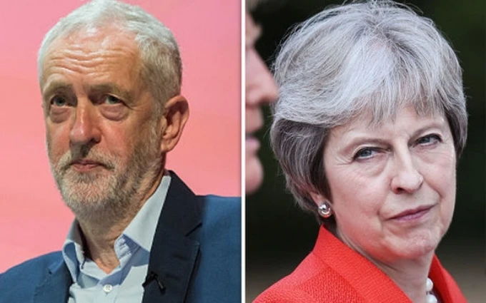 Thủ tướng Anh May và thủ lĩnh Công đảng đối lập Corbyn. (Ảnh: Getty Images)