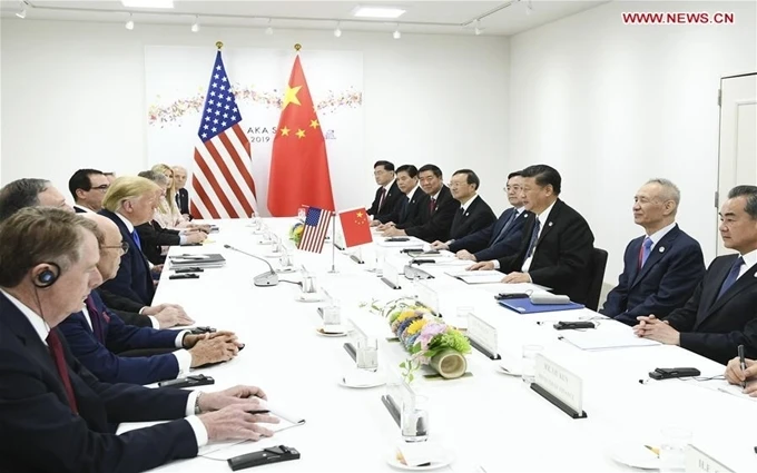 Tổng thống Mỹ Donald Trump và Chủ tịch Trung Quốc Tập Cận Bình tại cuộc gặp ở Osaka, Nhật Bản, ngày 29-6. (Ảnh: Tân Hoa xã)