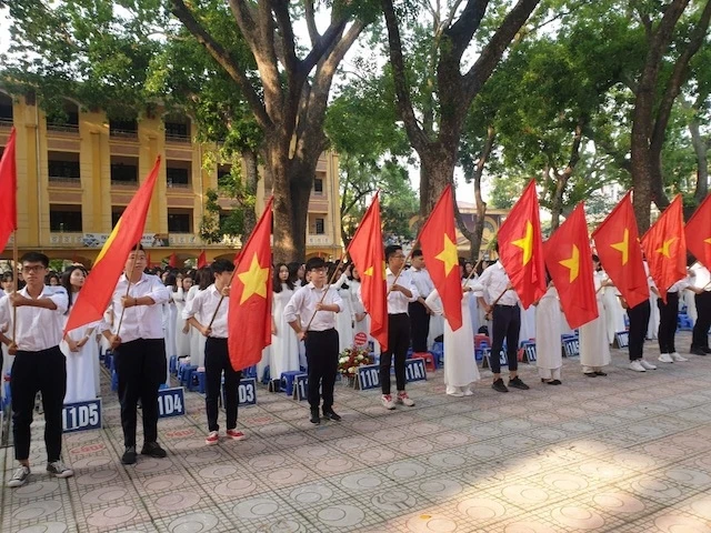 Học sinh Thủ đô Hà Nội trong lễ khai giảng sáng 5-9. (Ảnh: MINH ĐỨC)