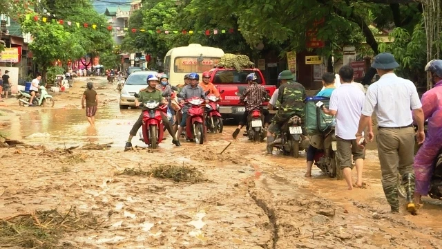 Nước lũ gây ngập nhiều tuyến đường ở thị trấn Yên Minh, huyện Yên Minh (tỉnh Hà Giang).