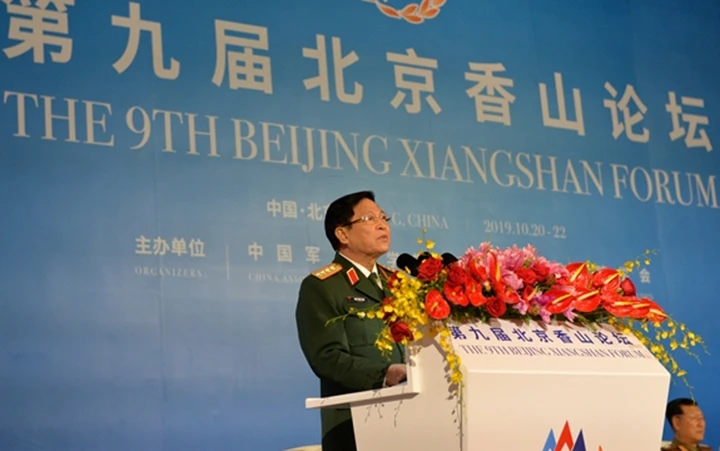 Bộ trưởng Ngô Xuân Lịch phát biểu tại Diễn đàn Hương Sơn Bắc Kinh lần thứ 9. Ảnh: báo Quân đội nhân dân.