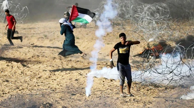 Đụng độ giữa binh sĩ Israel và người Palestine ở dải Gaza. Ảnh: Reuters