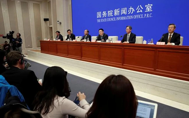 Họp báo tại Bắc Kinh thông báo về thỏa thuận giữa Trung Quốc và Mỹ. Ảnh REUTERS