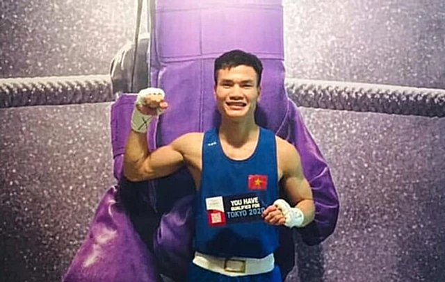 Niềm vui của võ sĩ Nguyễn Văn Đương với tấm vé chính thức dự Olympic Tokyo 2020.