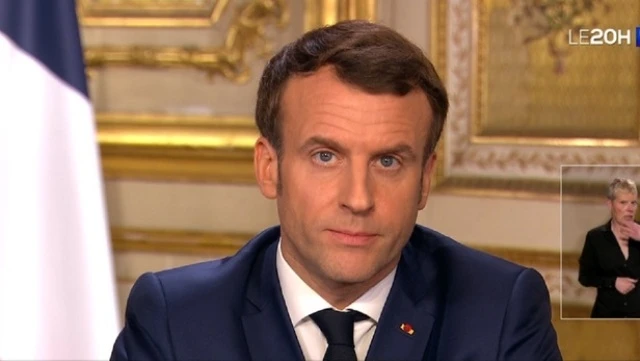 Tổng thống Emmanuel Macron công bố các biện pháp khẩn cấp chống dịch bệnh Covid-19 trên truyền hình tối 12-3. 