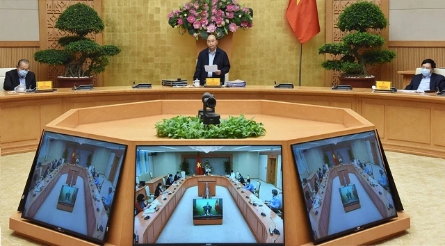 Thủ tướng Nguyễn Xuân Phúc chủ trì họp Thường trực Chính phủ, ứng phó dịch Covid-19, ngày 30-3.