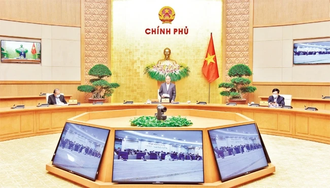 Thủ tướng Nguyễn Xuân Phúc phát biểu ý kiến tại phiên họp trực tuyến Chính phủ thường kỳ tháng 3-2020. Ảnh: Trần Hải 