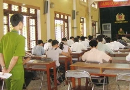 Thí sinh làm bài thi môn Địa tại Học viện Cảnh sát Nhân dân.